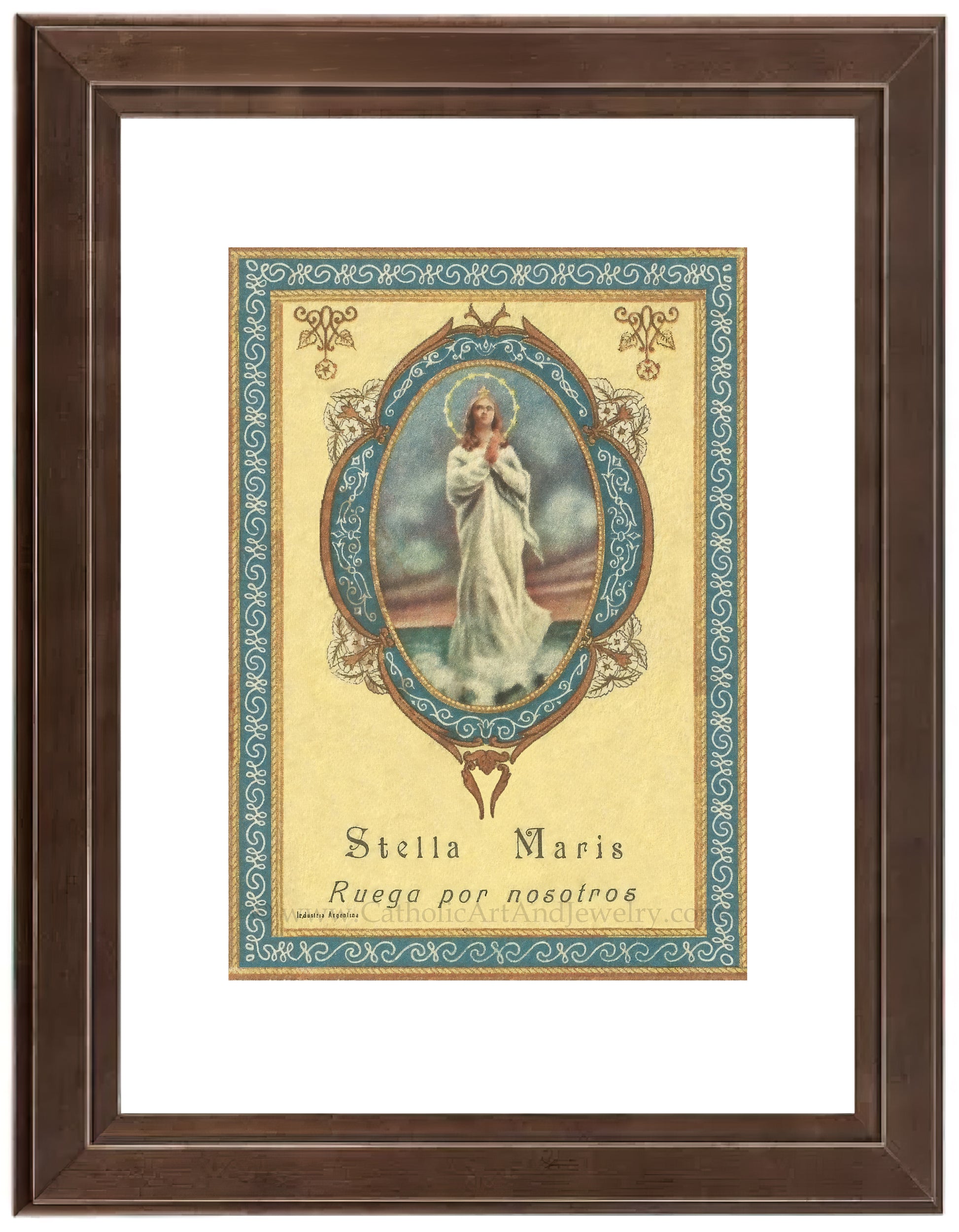 a framed picture of a woman in a white dress