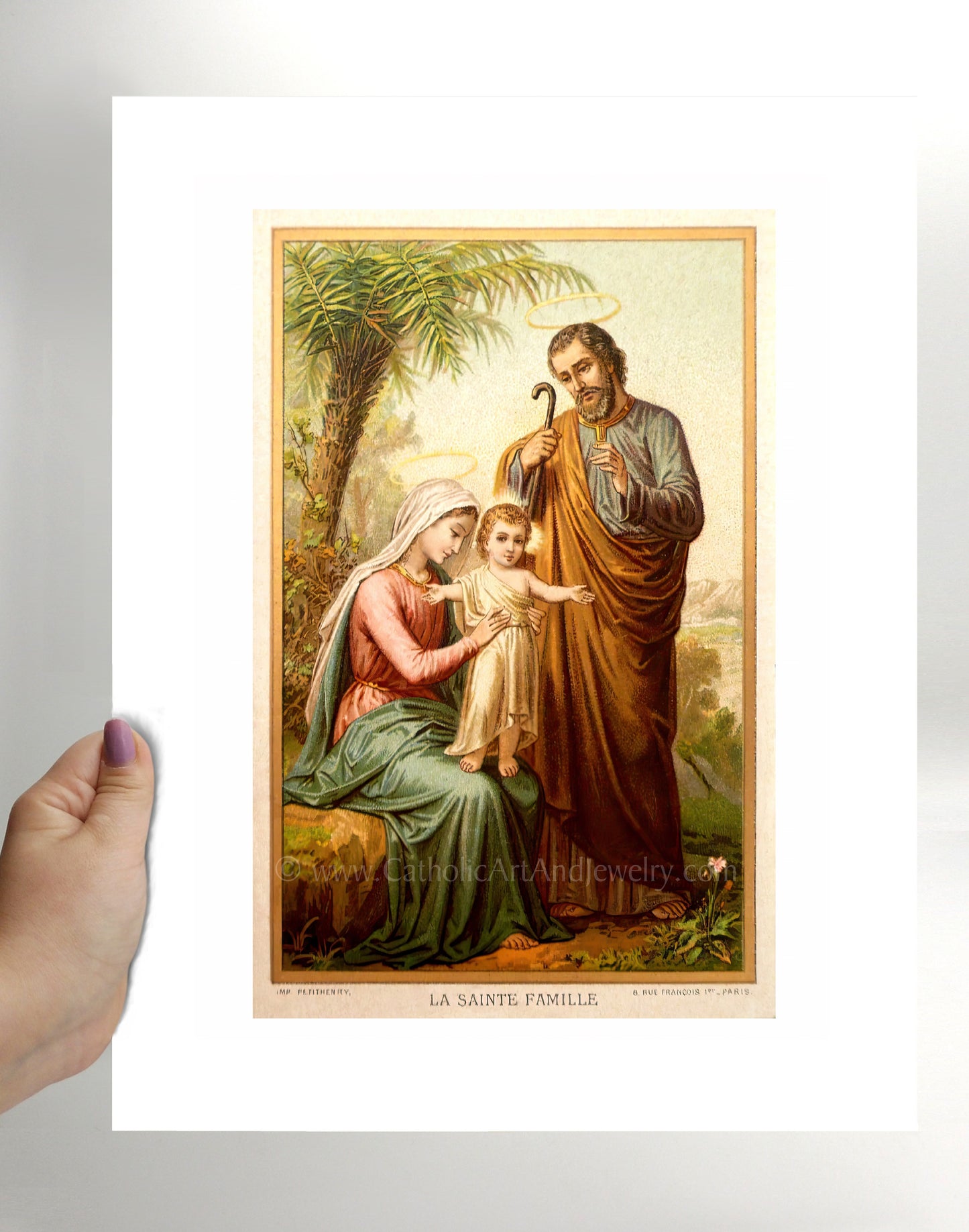 a painting of jesus holding a child in his lap